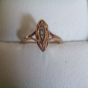 10k ring 3 small diamonds solid gold..